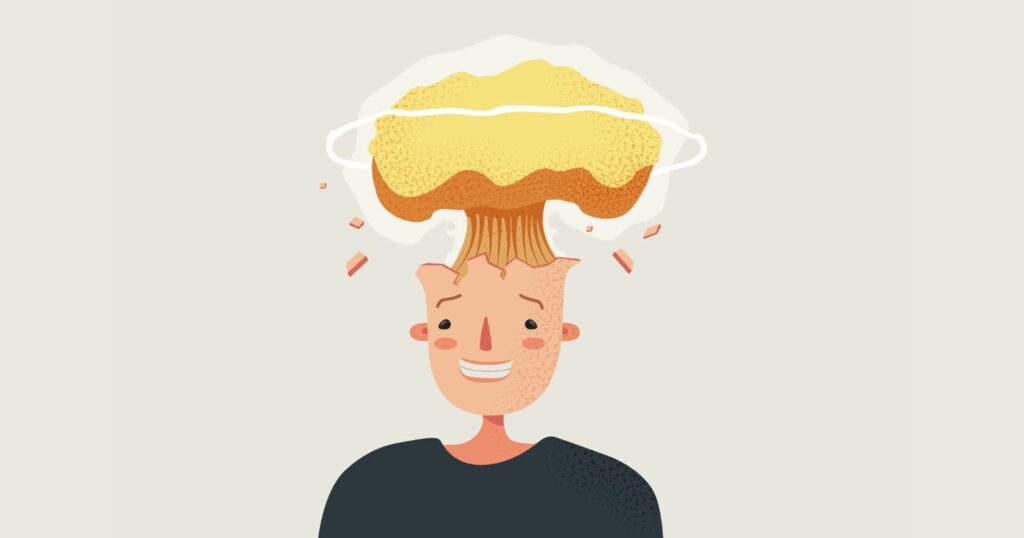 A képen egy rajzolt fejen olyan a haj, mint egy atombombafelhő